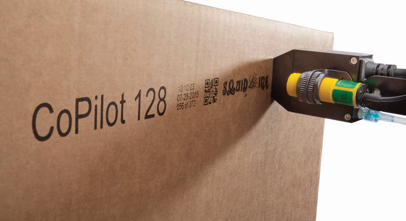 Squid CoPilot 128 printhead printing text and a barcode on a corrugated case